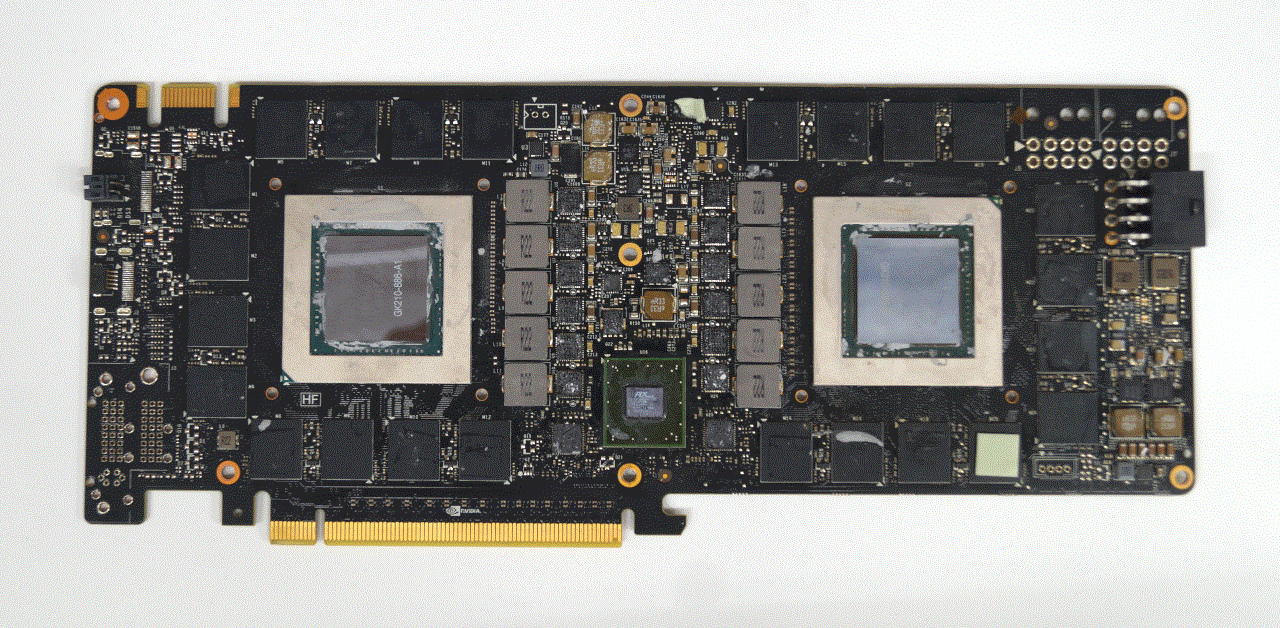 A Tesla K80 with its heatsinks and shrouds removed. The two bare dies are visibly clean from thermal paste.