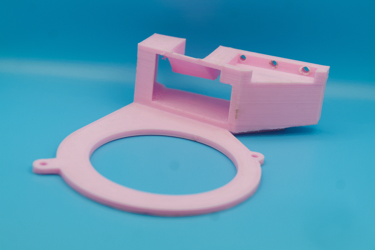 A blower-style fan bracket mount for the Tesla K80, 3D printed in Pink PETG.