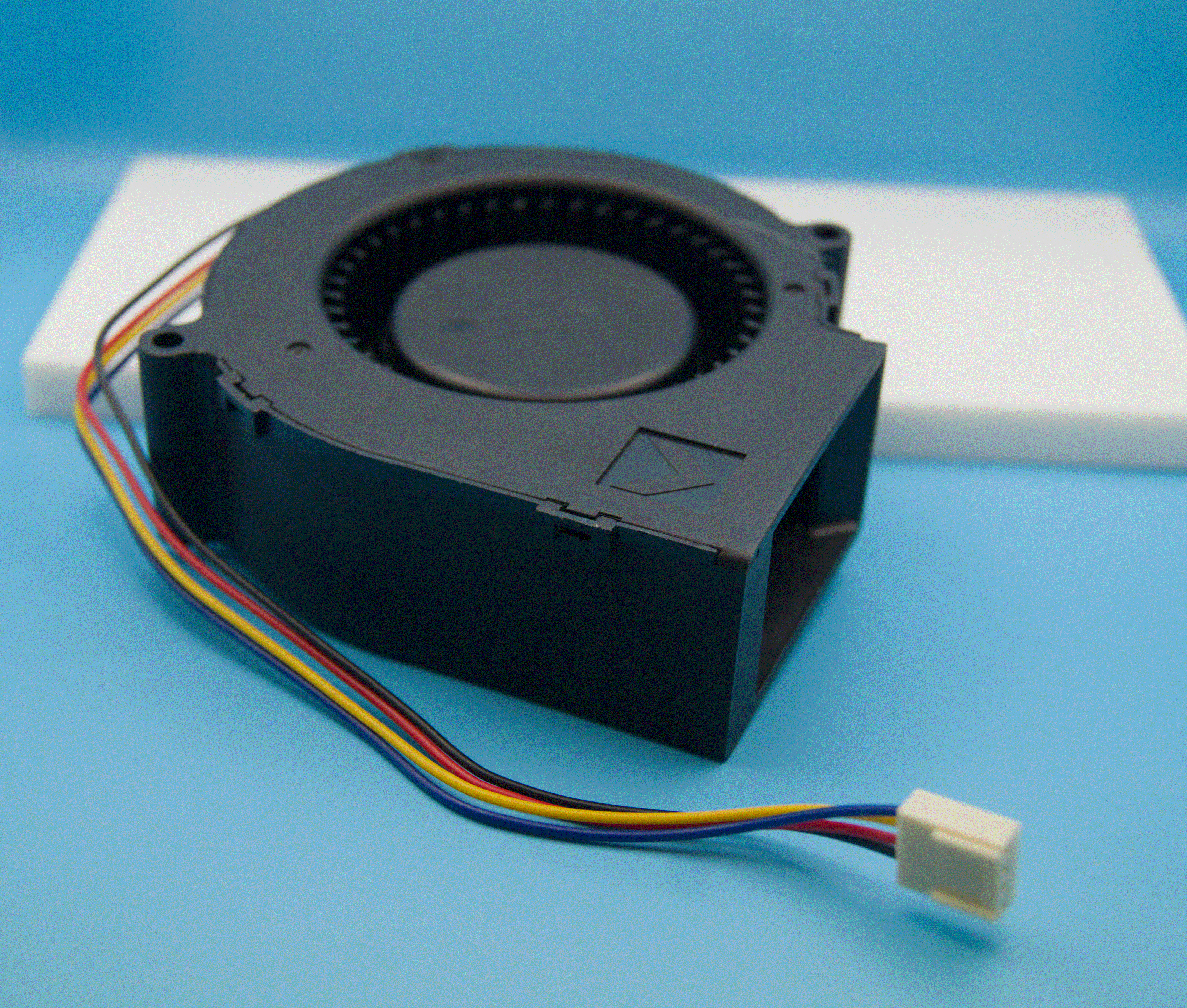 A large 12V PWM blower fan with a 4-pin cable.